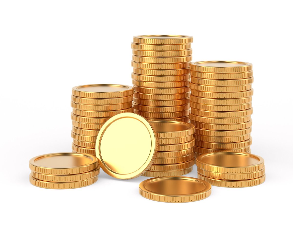 Golden coins arranged on a white background