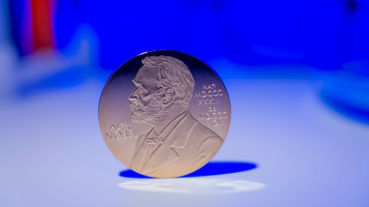A rare coin displayed on a laboratory table under examination